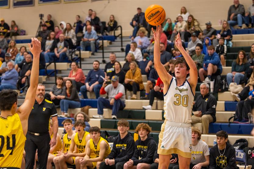 Students play basketball